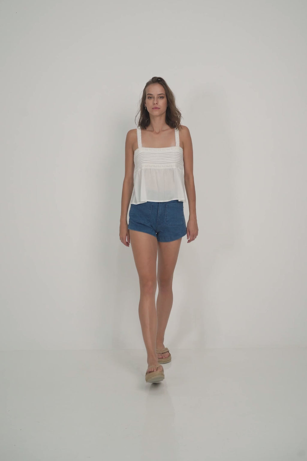 Model Wears High Rise Denim Shorts in Australia