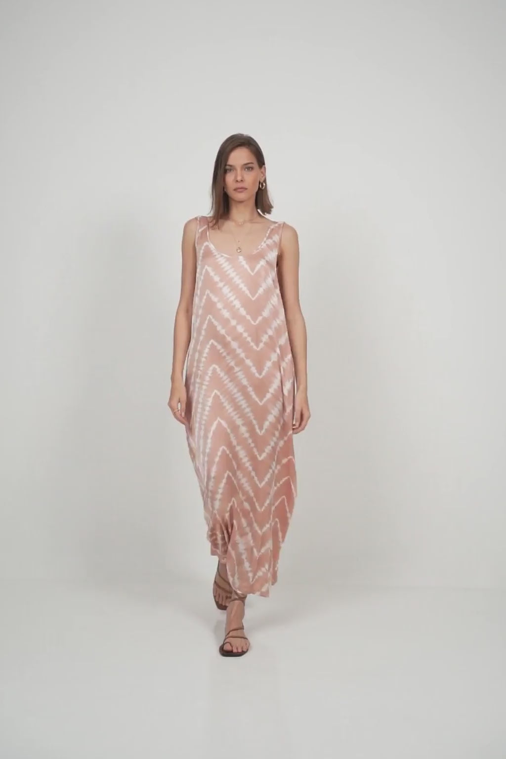 Detail of the scoop neckline and soft sheen of the fabric