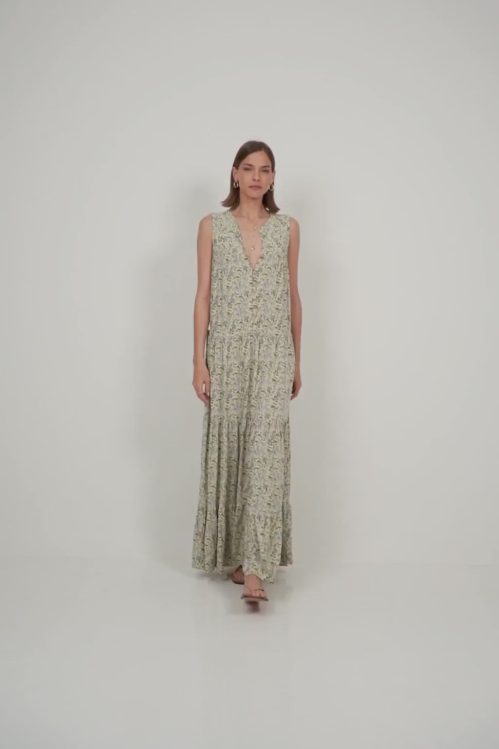 A model wearing a floral maxi dress for Summer