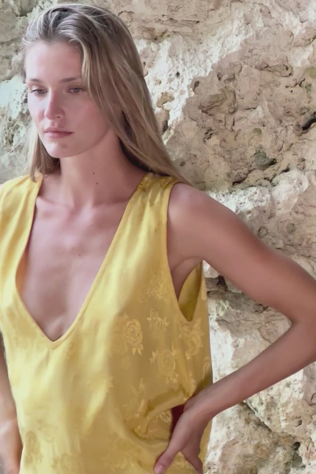 Video showing the subtle sheen on the yellow Marlow Mini with floral jacquard