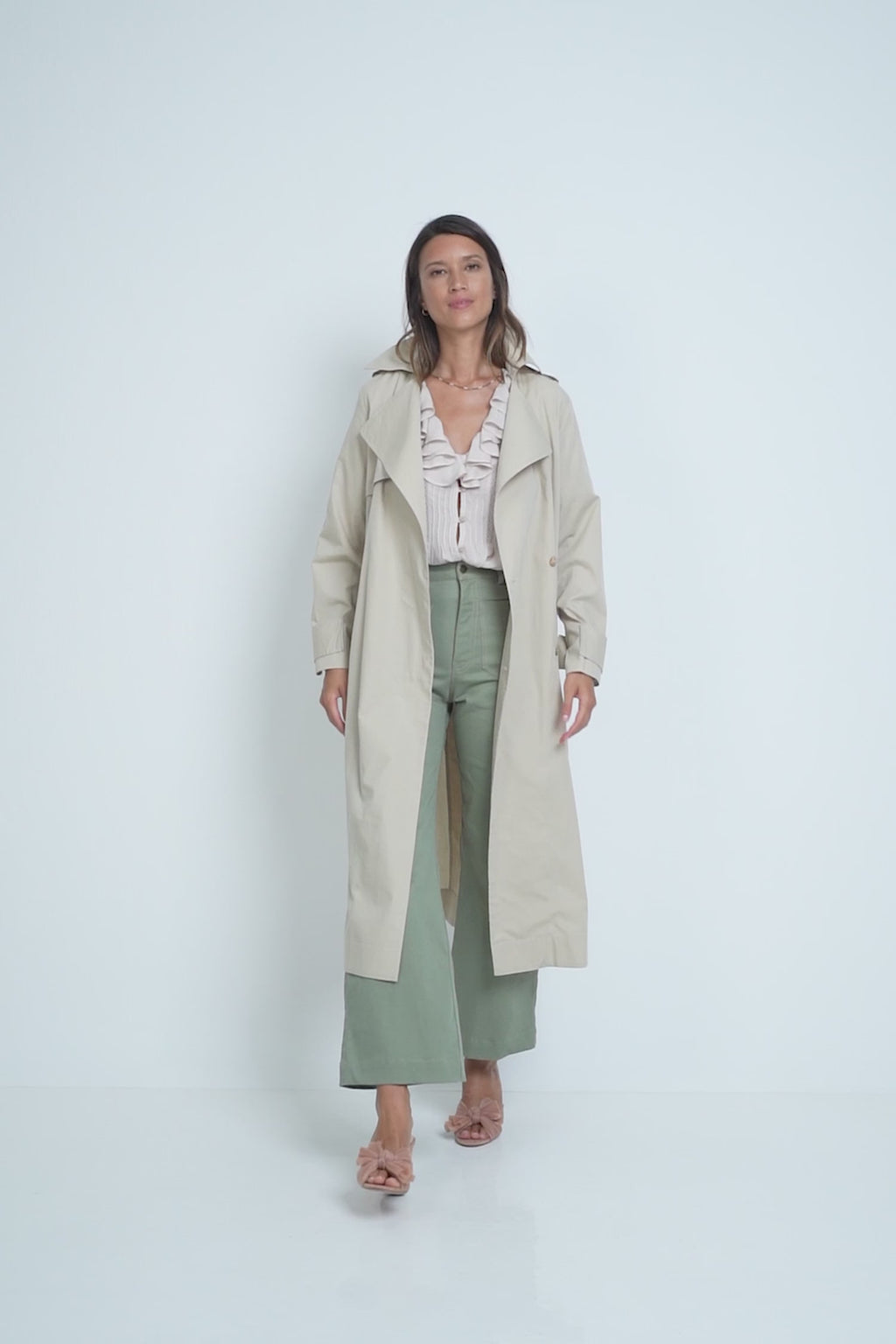A Model Wearing a Trench Coat by LILYA