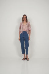 Back view of floral puff sleeve blouse by LILYA, spring fashion look