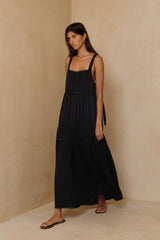 Black maxi dress with lace trim and relaxed silhouette 