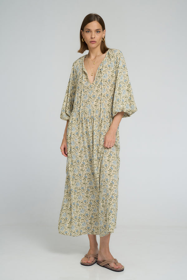 Breezy rayon maxi dress in feminine floral print, perfect for beachside escapes