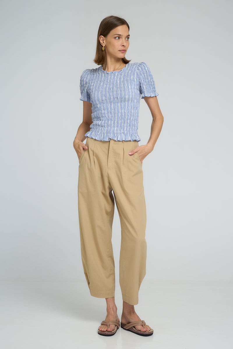 Model wearing sand cotton fashion pants