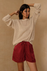 Soft satin shorts with elastic waistband and relaxed feminine silhouette 