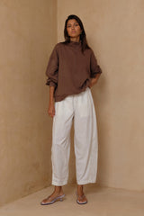 Breathable relaxed pants offering soft structure and easy wearability