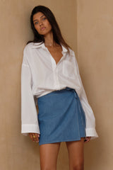 Relaxed white button shirt designed for effortless everyday dressing 