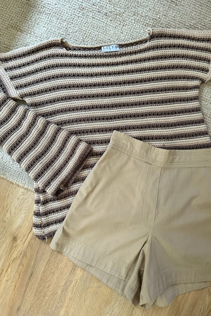 Close up of sand coloured Anise shorts by Lilya