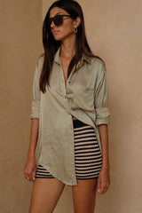 Lightweight satin button-through shirt styled for everyday elegance 