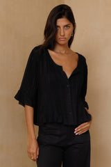 Black blouse with pintuck detailing and relaxed silhouette 