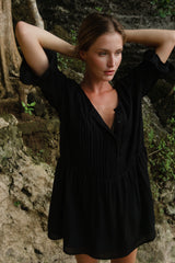 Front view of the Sonora Mini Dress in lightweight black rayon voile with a gathered drop waist.