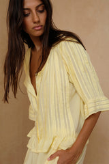 A light yellow rayon top for summer