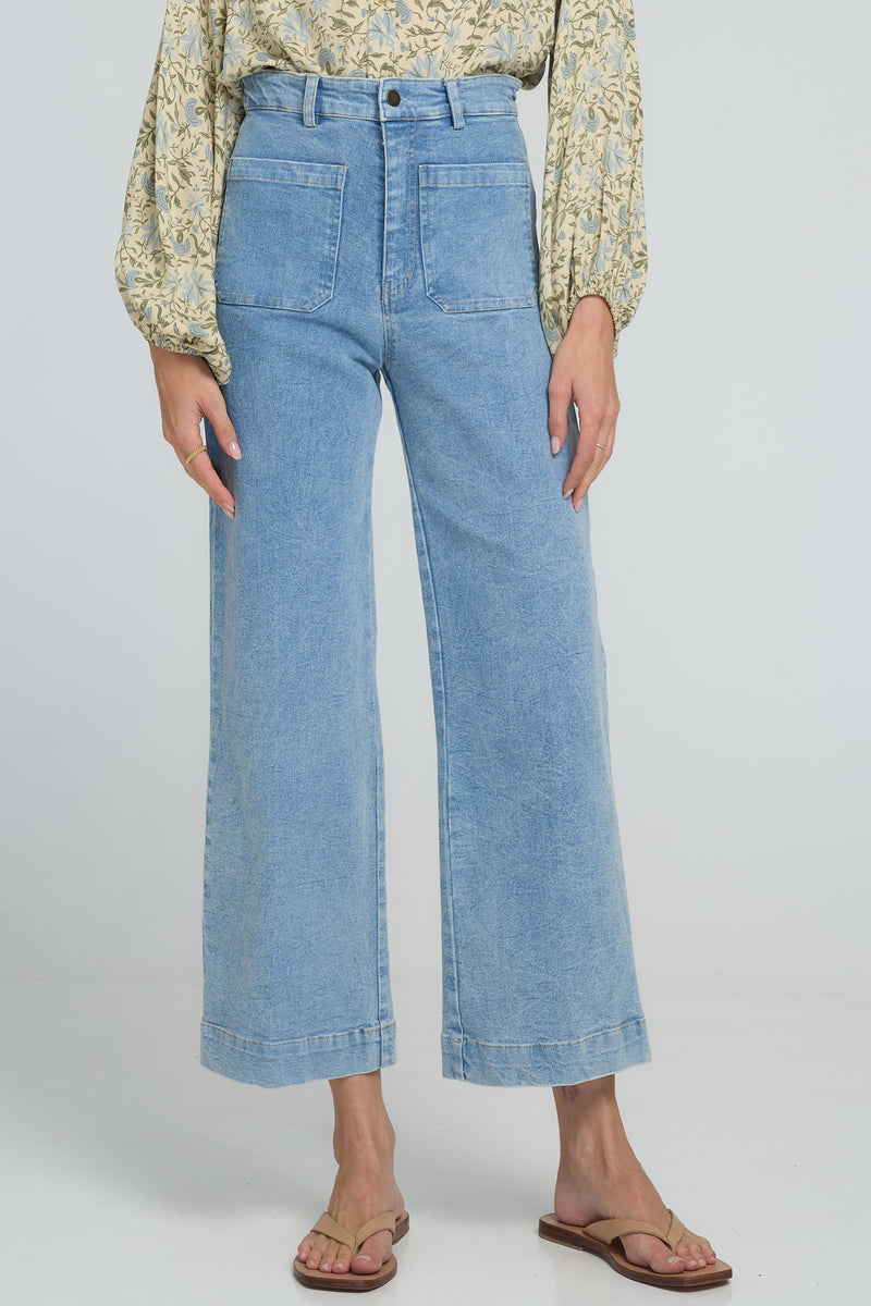 Close-up of Molly Jean's patch pocket detail and high waist