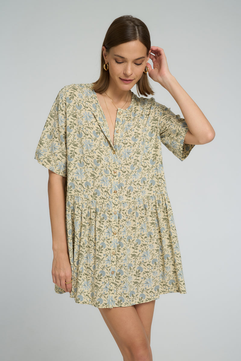 5.	Model in button-through mini floral dress by LILYA
