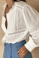 Timeless white blouse with relaxed silhouette and floaty movement