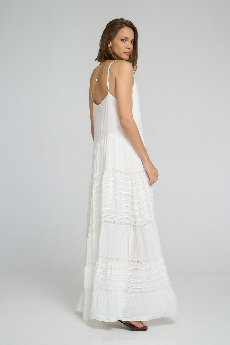 Back view showing adjustable straps and relaxed drape