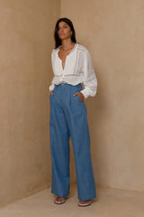Pacific Blue wide-leg pants with pleat detailing and contrast stitching