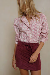 Handcrafted A-line mini skirt designed for confident winter dressing