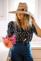 Jess wearing the Wodford Flora Top from her collection with Lilya. 