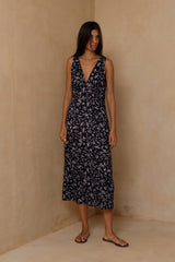 Lightweight floral dress styled for holidays and warm-weather occasions 