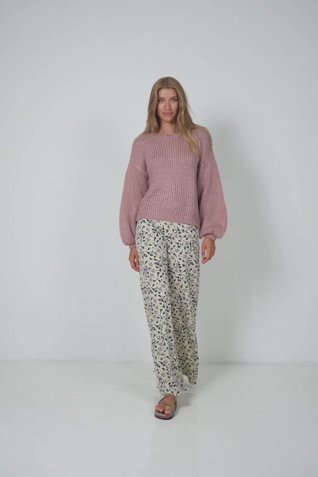 A Model Wearing Floral 70's Flare Leg Pants